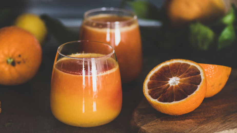 glasses of fresh blood orange juice or smoothie, square crop
